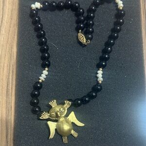 Gold and Black Beaded Necklace with Angel Pendant